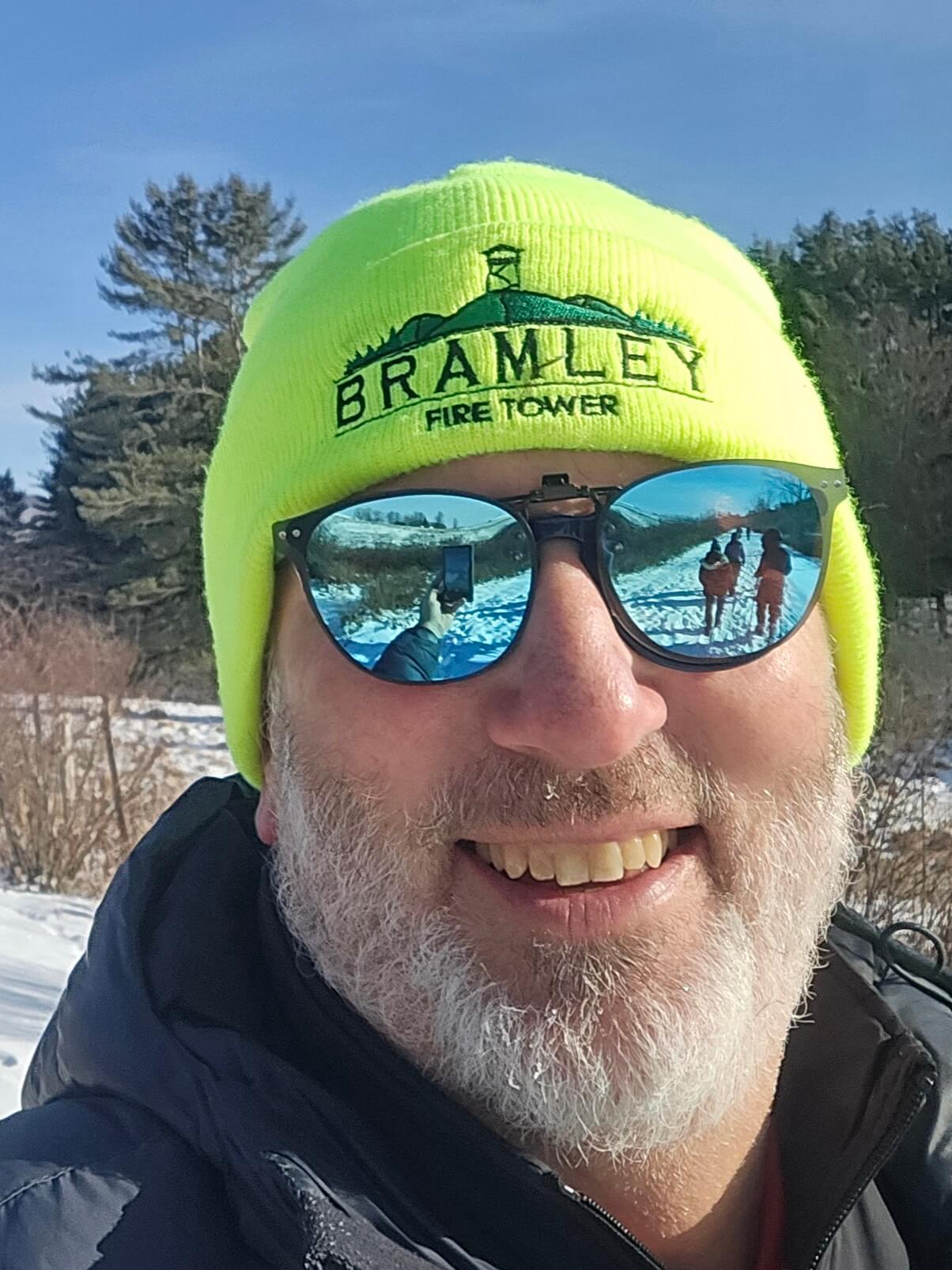 man wearing a winter hat and sunglasses