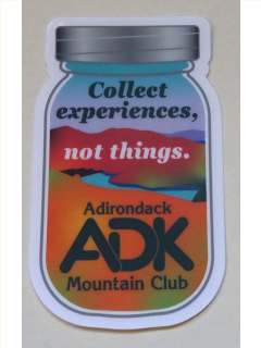 Sticker in shape of mason jar with text collect experiences, not things and green ADK logo
