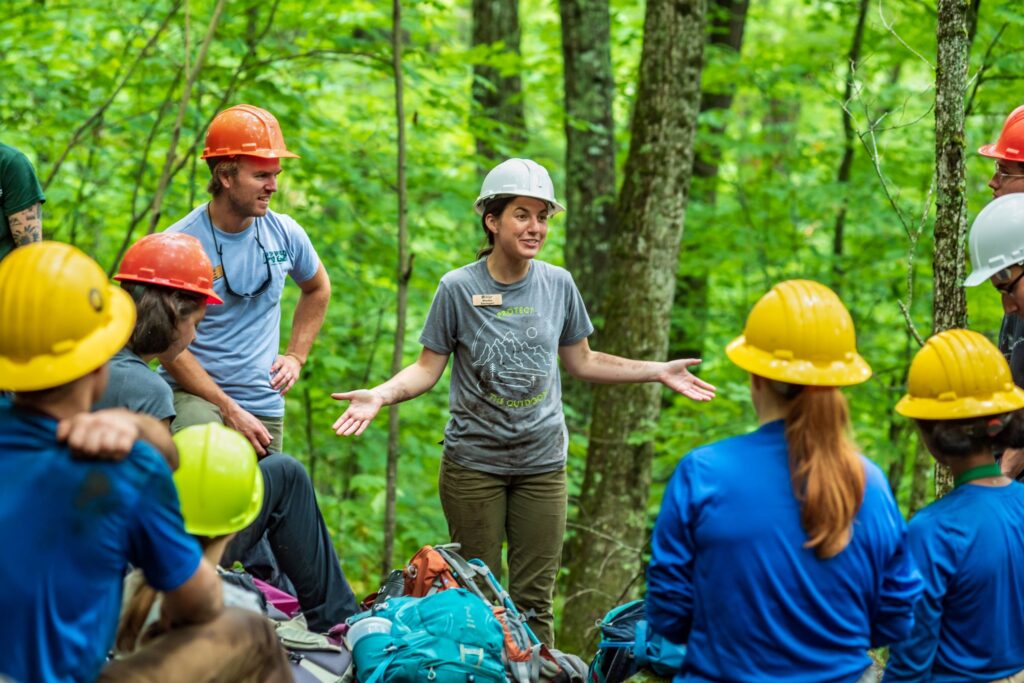 A woman talking to a group