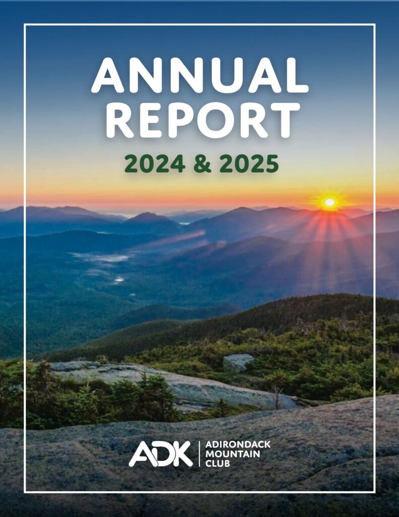 ADK 2024–25 Annual Report Cover, featuring a photo from a mountain summit at sunrise