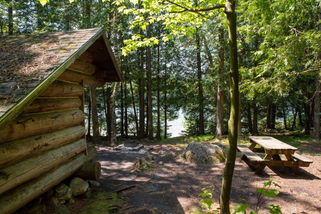 a lean-to overlooking a lake in the Adirondacks