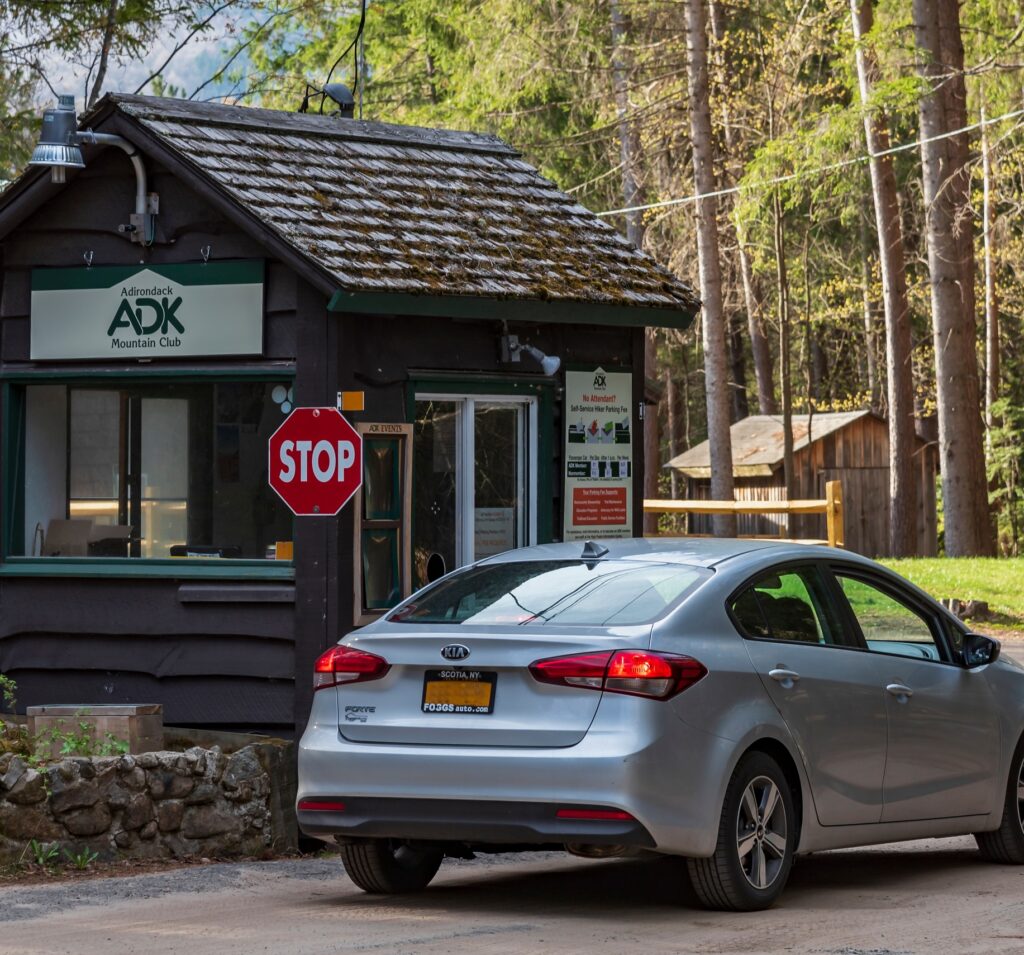 car at a parking booth