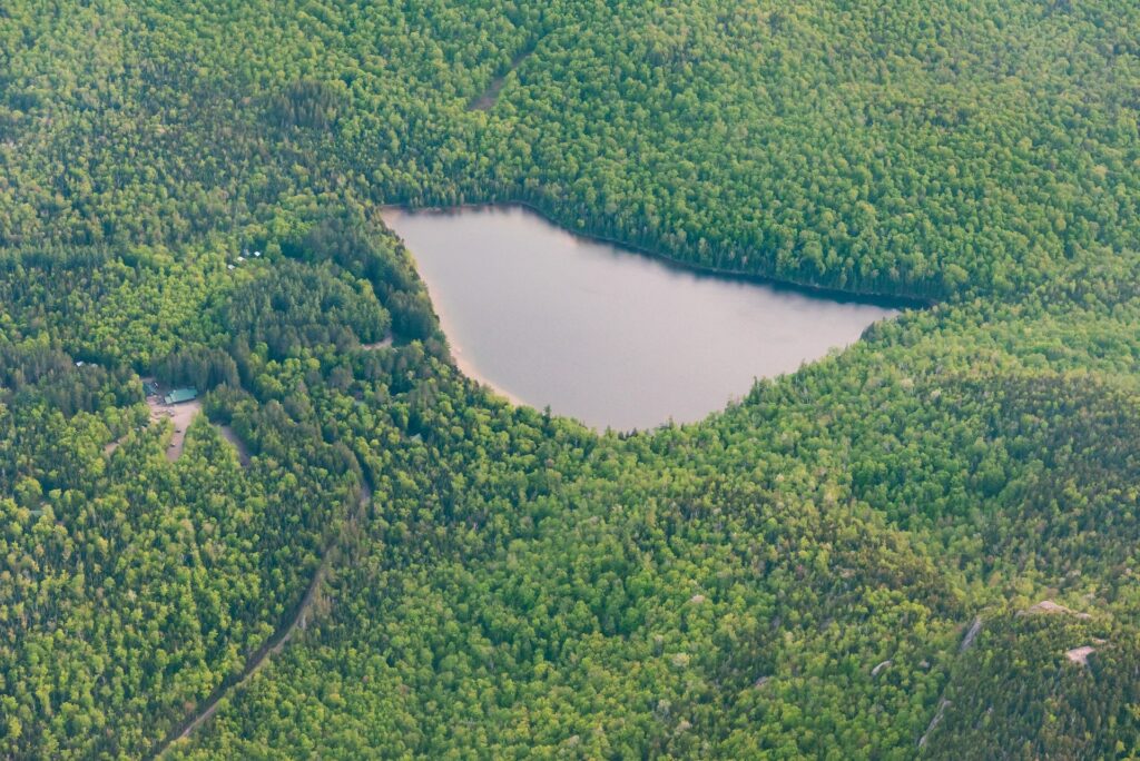 aerial view of heart lake in the adirondacks during the summer