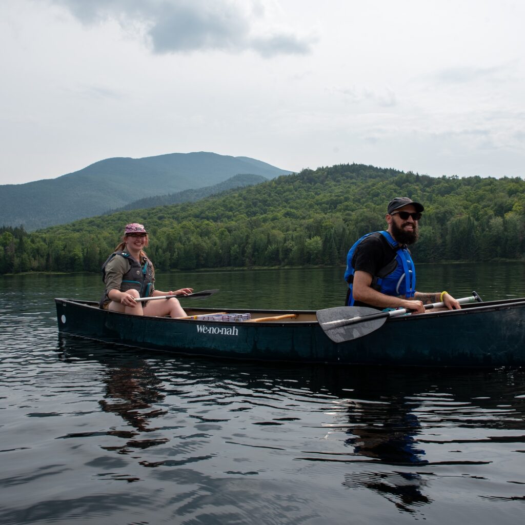 two paddlers on heart lake