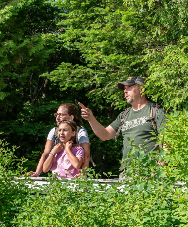 family outdoors at Heart Lake Program Center