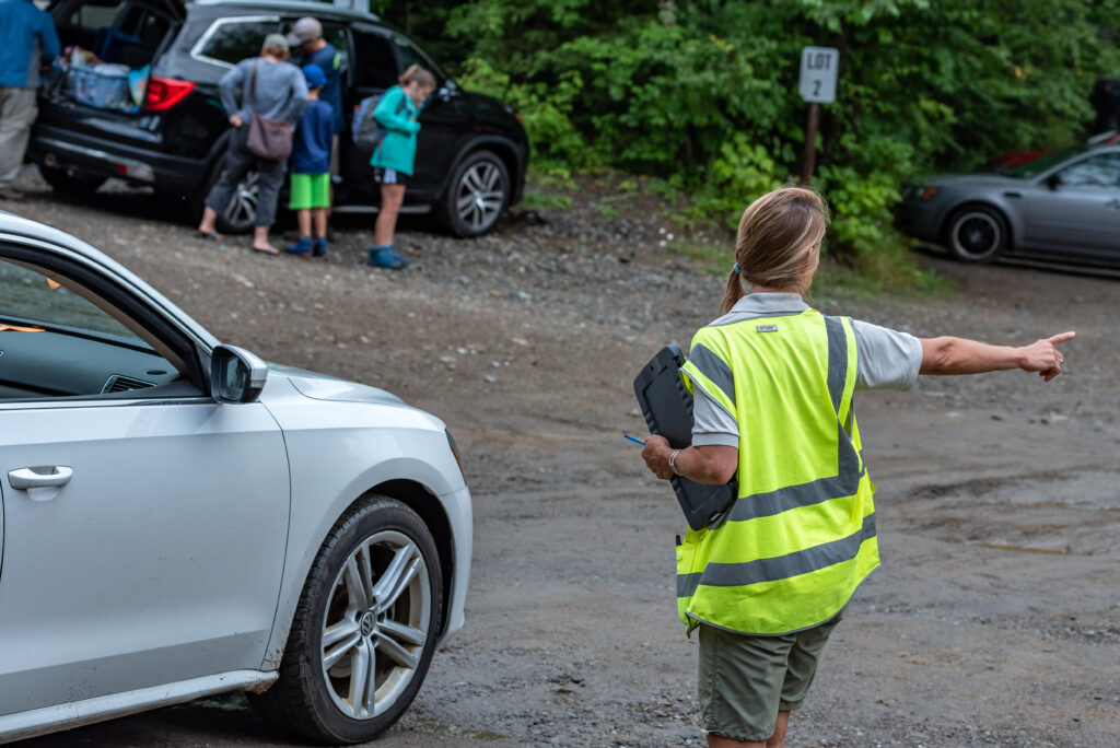 Steward in the parking lot by the High Peaks Information Center