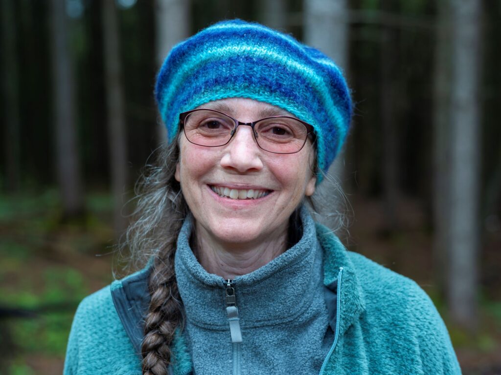 portrait of a woman in a blue hat