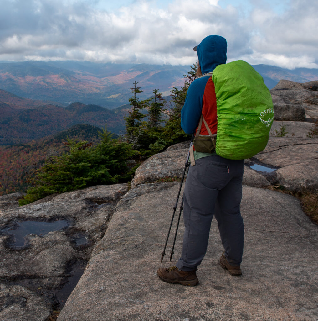 hiker facing summit view