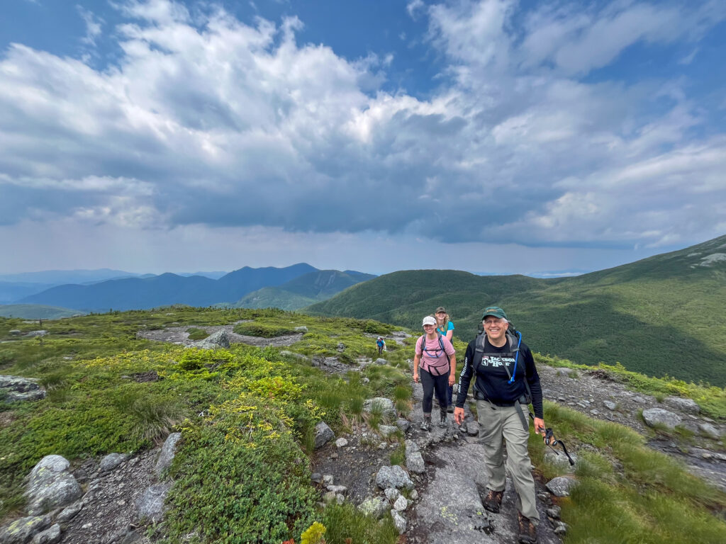 Hikers on skylight and gray