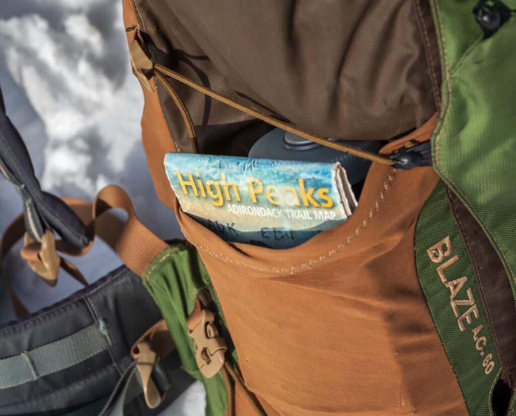 map tucked away in a backpack pocket