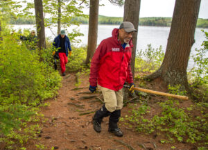 volunteers doing trail work