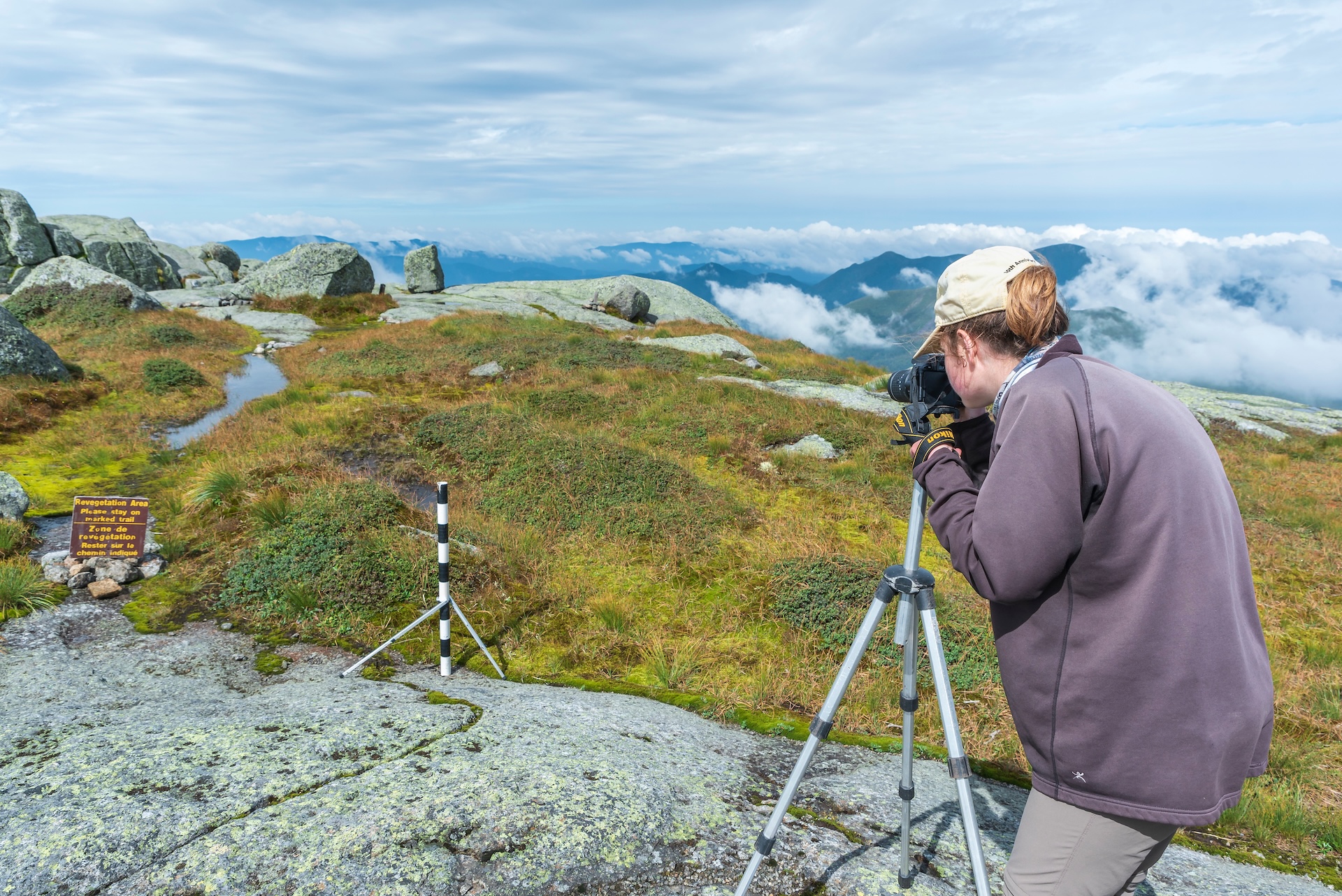a summit steward conducting photopoint monitoring