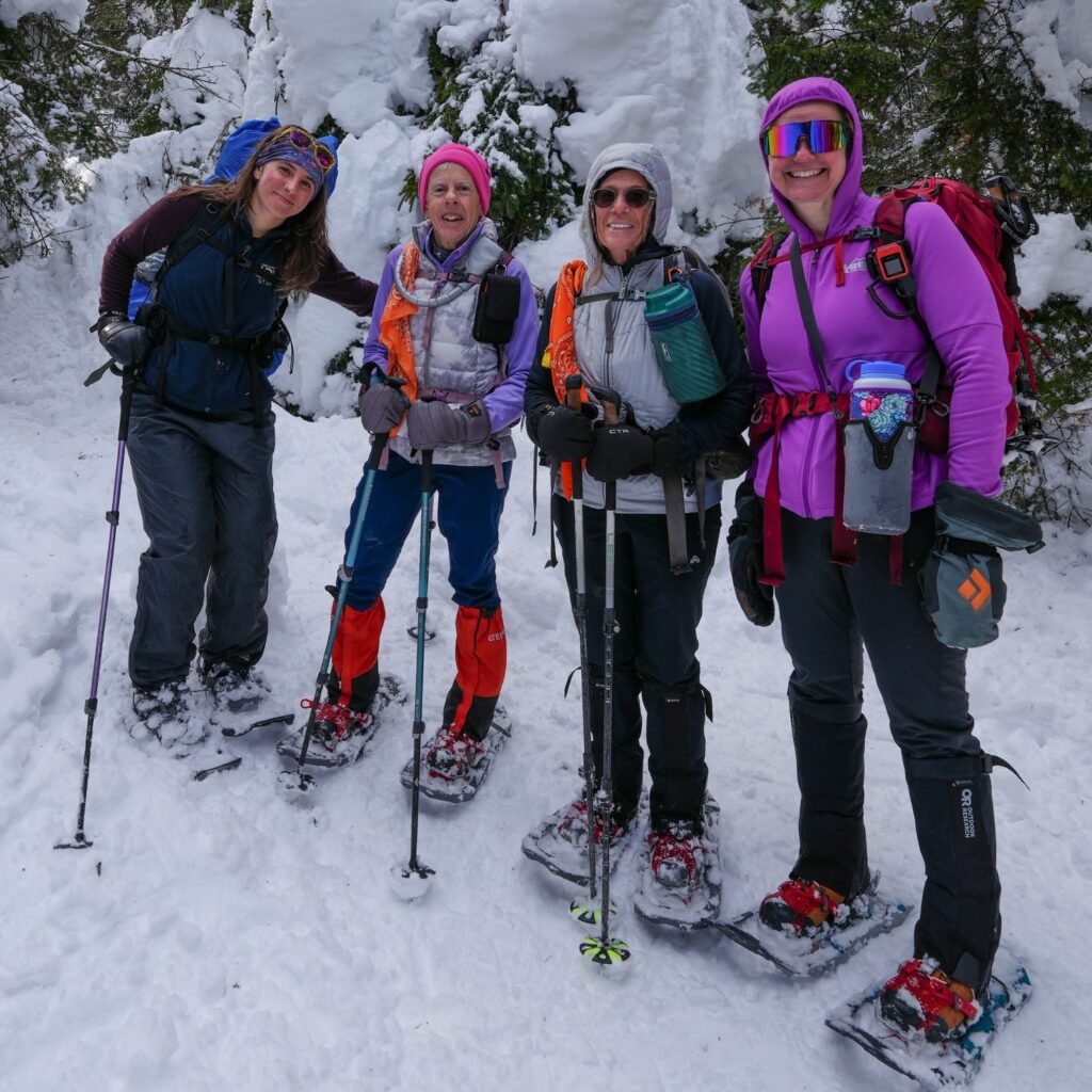 Elaina leads a winter guided hike to sawteeth