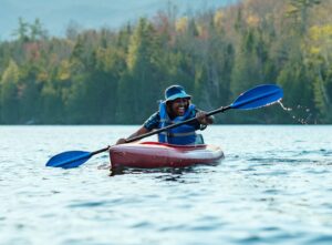paddler on heart lake in a kayak
