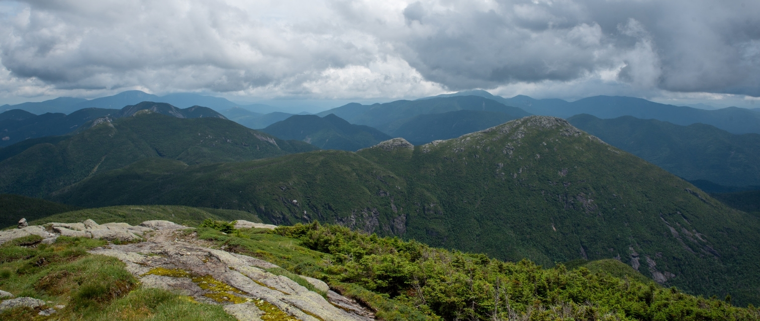 view from the summit of marcy on a cloudy day