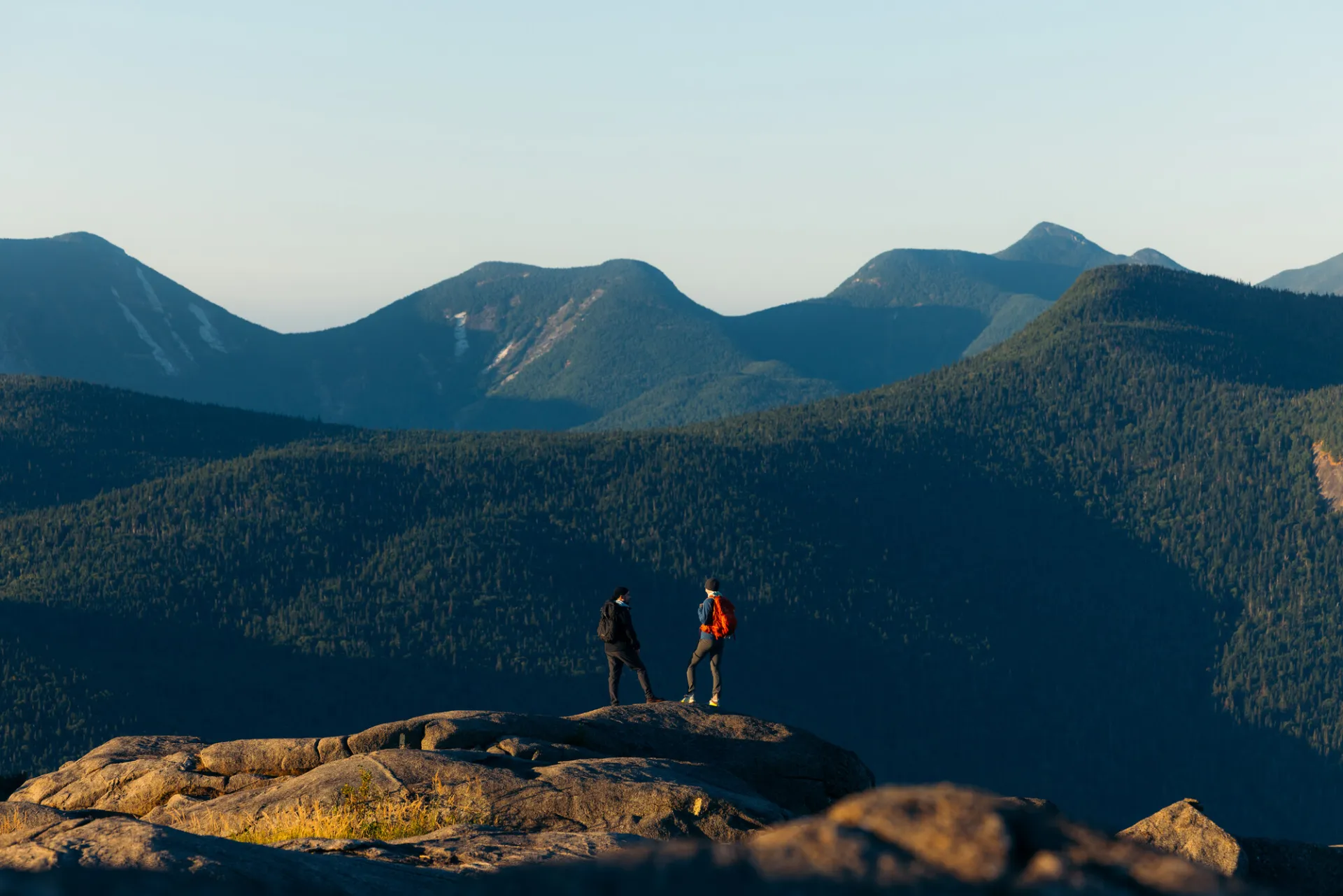 Couple hiking to the summit of an Adirondack High Peak