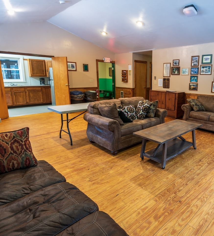 living room with three couches