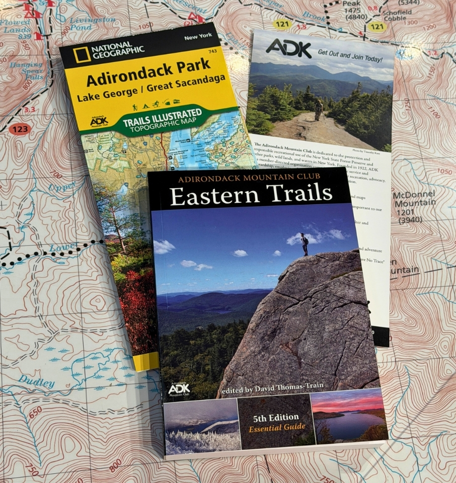 ADK Eastern Trails Map Pack displayed on a map table