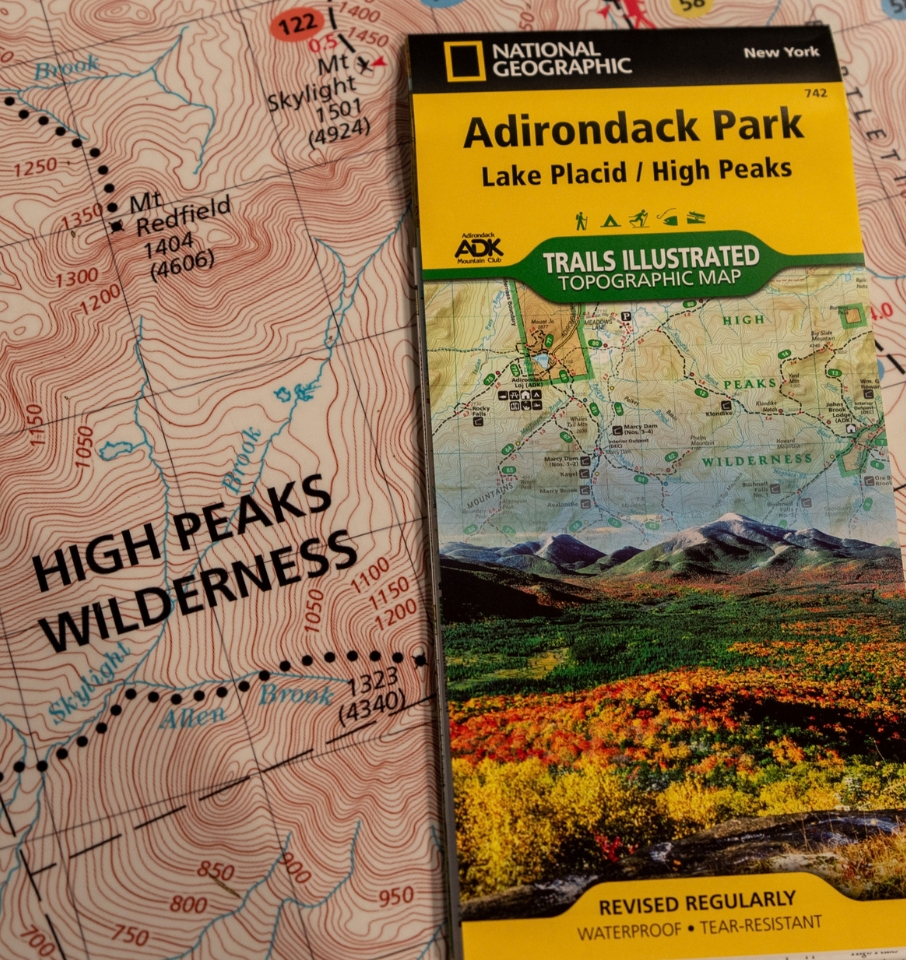 adirondack park lake placid high peaks trails illustrated map on a map table