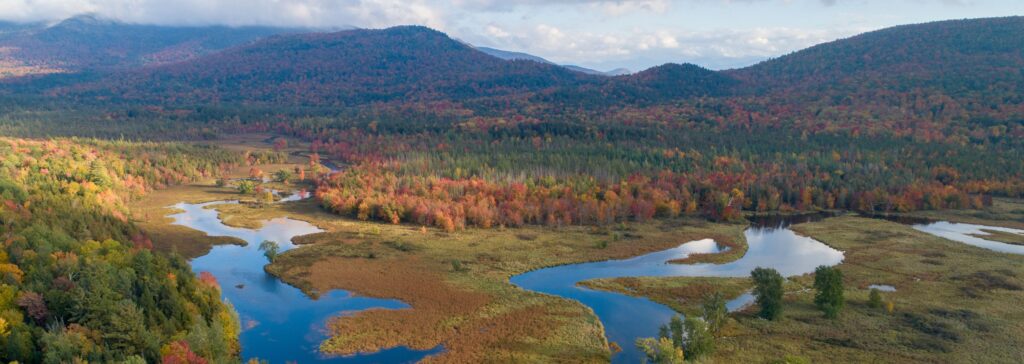 Saranac River in autumn with fall foliage