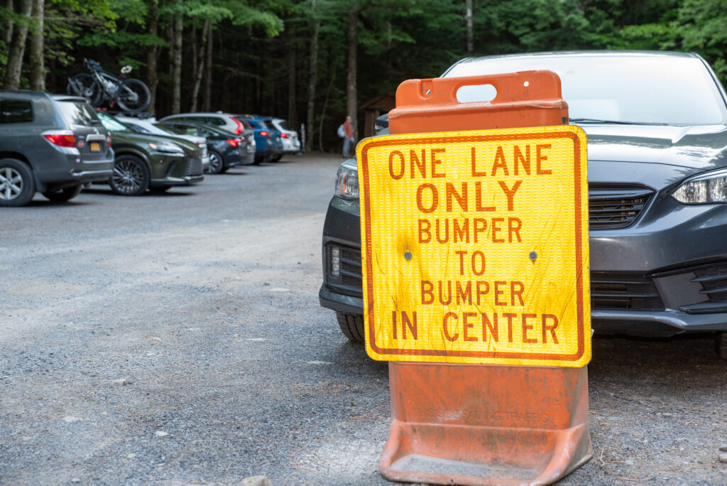 one lane only parking sign at the garden parking lot in keene, New York