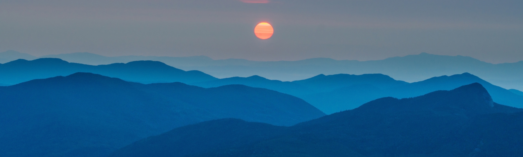 panoramic shot of a sunrise over Adirondack mountains